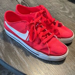 Bright red Nikes! Worn a few times. Amazing condition. Super light